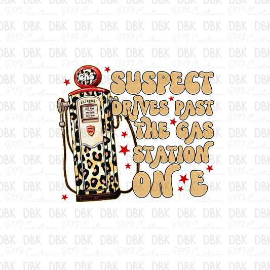 Suspect drives past the gas station on E DTF Transfer